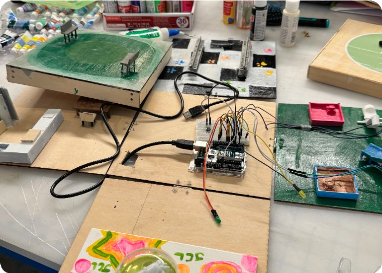An electronics project on a classroom workbench.