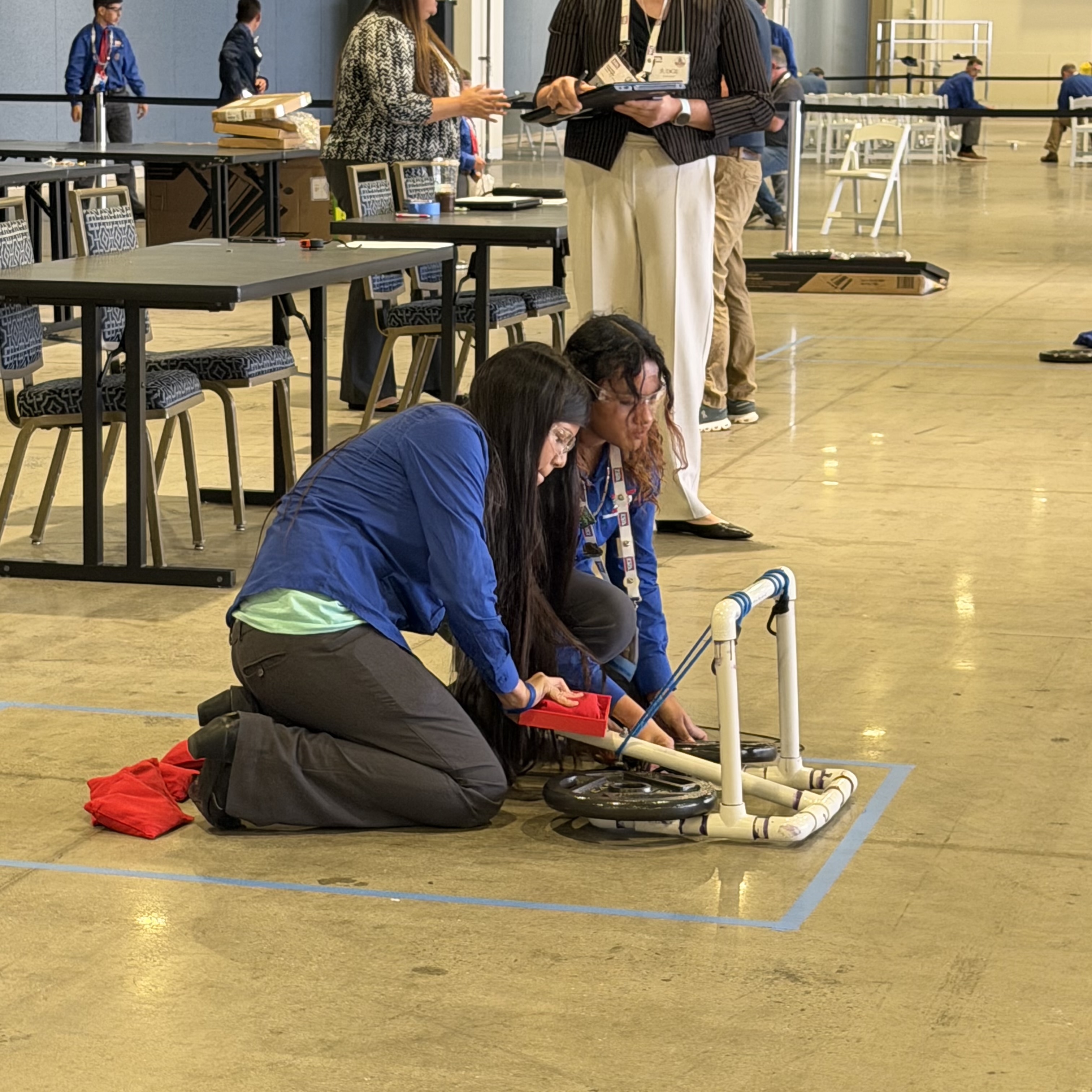 Bowie students prepare their catapult for competition.